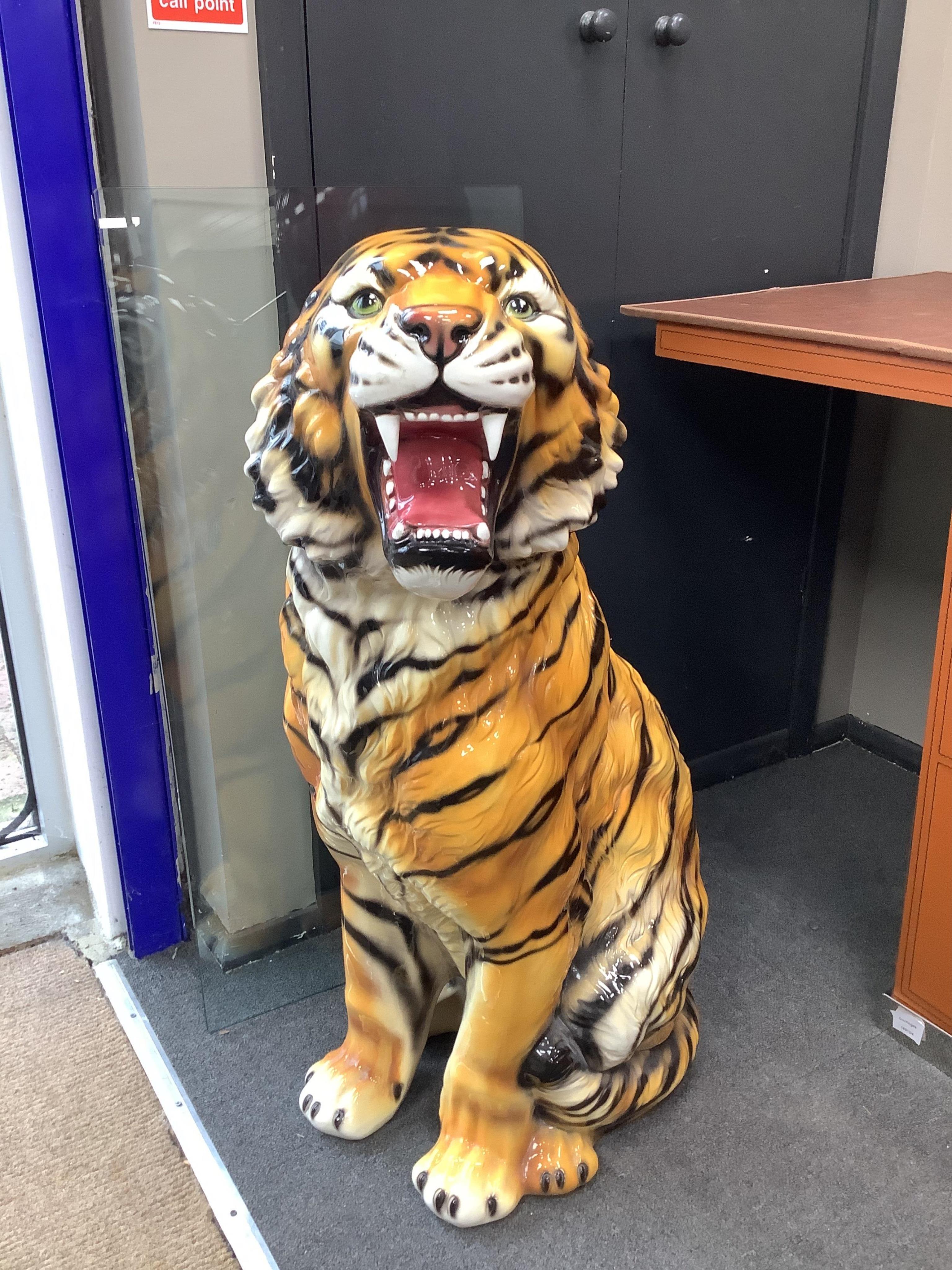 An Italian majolica seated tiger, height 90cm. Condition - good